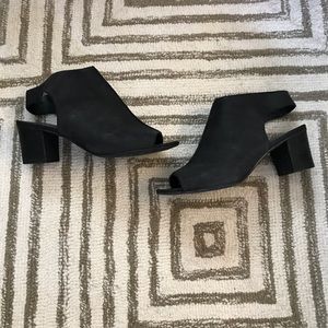 Black peep-toe sling backs